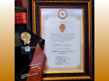 Piagam NTB Gemilang Award yang diberika kepada Pemerintah Kabupaten Lombok Timur